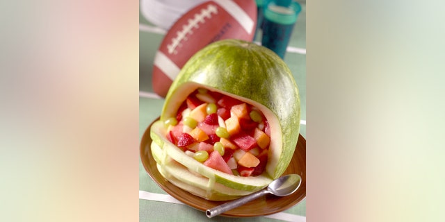 Though it's hard to imagine munching on anything other than salty snacks or sweet treats during the game, there's virtue in offering at least one healthy treat.