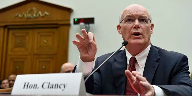 Acting Secret Service Director Joseph Clancy testifies on Capitol Hill in Washington, Wednesday, Nov. 19, 2014.