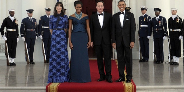 March 14, 2012: President Barack Obama and first lady Michelle Obama with Britain's Prime Minister David Cameron and his wife Samantha Cameron as they arrive in the North Portico of the White House prior to a State Dinner