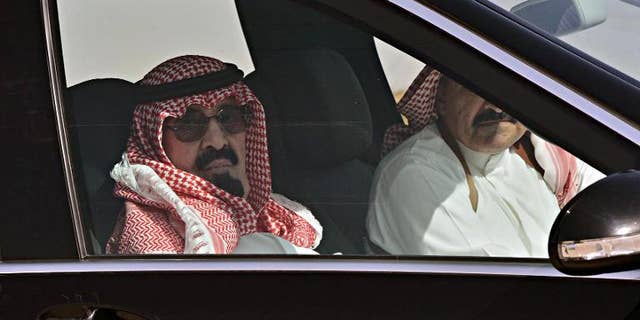 A picture released on March 3, 2013 shows King Abdullah bin Abdulaziz al-Saud arriving at Rawdat al-Khuraim to visit his farm