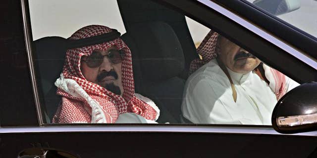 A picture released on March 3, 2013 shows King Abdullah bin Abdulaziz al-Saud arriving at Rawdat al-Khuraim to visit his farm