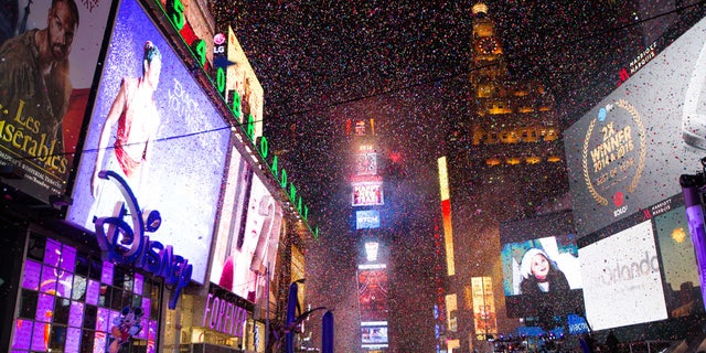 FILE -- Confetti falls during the annual New Year's Eve celebration in Times Square.