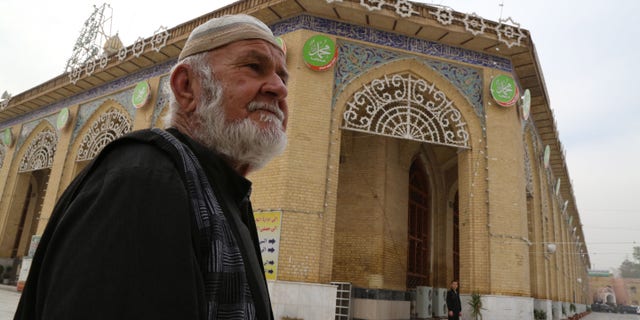 A Sunni worshiper leaves the Sunni Abu Hanifa mosque after he finds out it is closed at Azamiya area in north Baghdad, Iraq, Saturday, Nov. 23, 2013. Sunni religious leaders said on Saturday that they have decided to close down the sect’s mosques in Baghdad indefinitely to protest attacks targeting clerics and worshippers, highlighting Iraq’s deepening sectarian rift. (AP Photo/Karim Kadim)