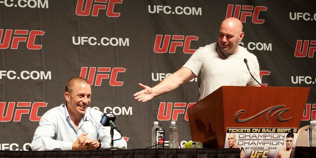 LAS VEGAS - SEPTEMBER 07: (R-L) Dana White & Georges St-Pierre at the UFC 137 Press Conference at the Mandalay Bay Events Center on September 7, 2011 in Las Vegas, Nevada. (Photo by Kari Hubert/Zuffa LLC/Zuffa LLC via Getty Images)