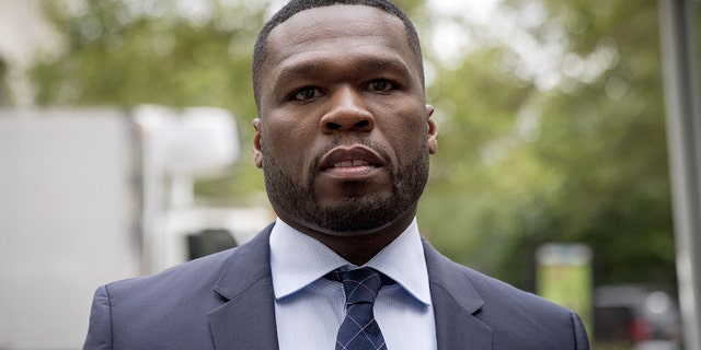Rapper 50 Cent, whose real name is Curtis James Jackson III, arrives at New York State Supreme Court in Manhattan, New York July 21, 2015. Rapper 50 Cent filed for bankruptcy protection on July 13, reporting debts and assets in the range of $10 million to $50 million. The 40-year-old New York-born entertainer called the voluntary Chapter 11 filing in a Connecticut bankruptcy court a "strategic business move" that would not affect fans. REUTERS/Brendan McDermid - GF10000165923