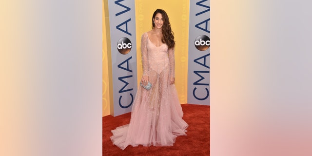 Aly Raisman arrives at the 50th annual CMA Awards at the Bridgestone Arena on Wednesday, Nov. 2, 2016, in Nashville, Tenn. (Photo by Evan Agostini/Invision/AP)