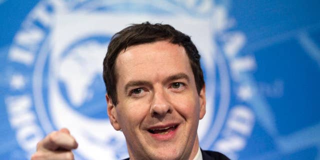 FILE - This is a Thursday, April 14, 2016 file photo of Britain's Chancellor of the Exchequer George Osborne while speaking at a news conference during the the G5 Ministers of Finance meeting during the World Bank/IMF Spring Meetings in Washington. Britain's Treasury says house prices could fall by up to 18 percent if the country leaves the European Union — a claim dismissed as scaremongering by campaigners for a U.K. exit from the bloc. ( AP Photo/Jose Luis Magana, File)