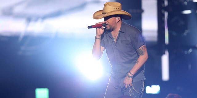 April 3, 2016: Jason Aldean performs Lights Come On at the 51st annual Academy of Country Music Awards at the MGM Grand Garden Arena in Las Vegas. (Photo by Matt Sayles/Invision/AP)