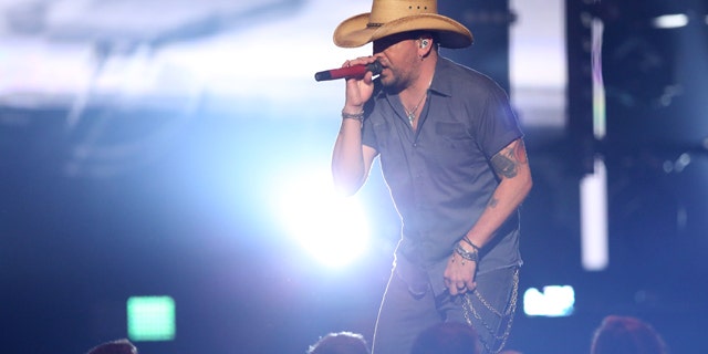 April 3, 2016: Jason Aldean performs Lights Come On at the 51st annual Academy of Country Music Awards at the MGM Grand Garden Arena in Las Vegas. (Photo by Matt Sayles/Invision/AP)