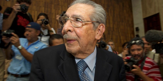 FILE - In this Friday, May 10, 2013 file photo, Guatemala's former dictator Jose Efrain Rios Montt wears headphones as he listens to the verdict in his genocide trial in Guatemala City.