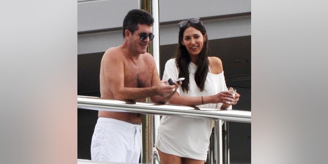 Simon Cowell soaking up the sun with Lauren Silverman in Saint Barths on January 4, 2012.