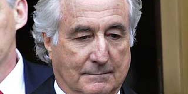 In this March 10, 2009 file photo, Bernard Madoff exits Manhattan federal court in New York.