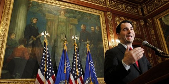 In this Feb. 17 photo, Wisconsin Gov. Scott Walker talks to the media at the State Capitol in Madison, Wis.