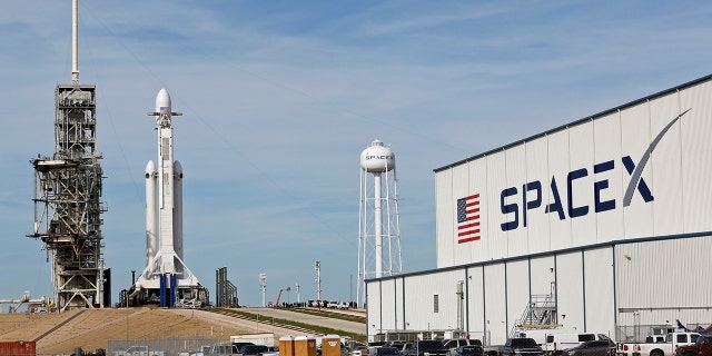 A SpaceX Falcon Heavy rocket stands on historic launch pad 39A as it is readied for its first demonstration flight at the Kennedy Space Center in Cape Canaveral, Fla.