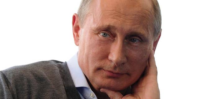 Russian President Vladimir Putin meets with participants in the youth educational forum at the Seliger youth camp near Lake Seliger, some 450 kilometres (281 miles) northwest of Moscow, in Tver region, Russia, Friday, Aug. 29, 2014. (AP Photo/RIA-Novosti, Mikhail Klimentyev, Presidential Press Service)