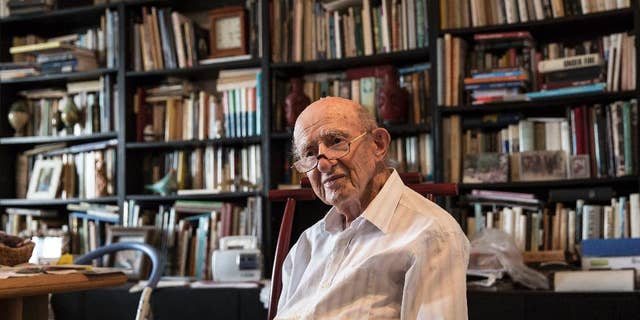 File - In this file photo made on Monday, May 23, 2016, Joseph Harmatz sits during an interview with the Associated Press at his apartment in Tel Aviv, Israel. Harmatz, a Holocaust survivor who led the most daring attempt of Jews to seek revenge against their former Nazi tormentors, has died. He was 91. Harmatz was one of the few remaining Jewish "Avengers" who carried out a mass poisoning of former SS men in an American prisoner-of-war camp in 1946 after World War II. The poisoning sickened more than 2,200 Germans but ultimately caused no known deaths.(AP Photo /Tsafrir Abayov, File)