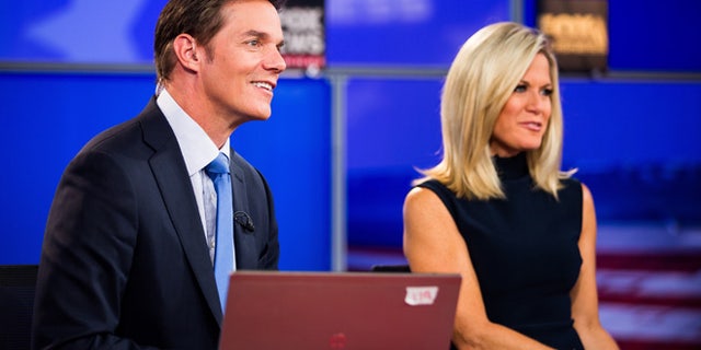 July 20, 2016: Fox News anchors Bill Hemmer and Martha MacCallum on set at the Republican National Convention in Cleveland, Ohio.