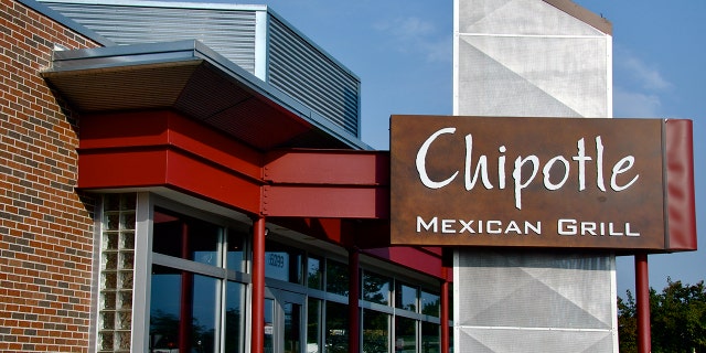 "Falls Church, VA, USA - August 19, 2011: Chipotle Mexican Grill sign. Chipotle Mexican Grill, Inc. (NYSE: CMG) is a popular American chain of over 1000 restaurants specializing in burritos and tacos. The name ""Chipotle"" comes from the Mexican word for a smoked, dried jalapeAo chili pepper."
