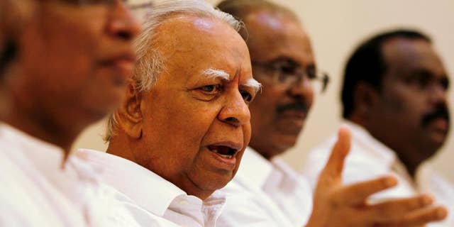 Tamil National Alliance leader Rajavarothayam Sampanthan speaks during a media briefing in Colombo, Sri Lanka, Tuesday, Dec. 30, 2014. Sri Lanka's main ethnic Tamil political party said that it will support opposition candidate Maithripala Sirisena in January's presidential election, in the latest blow to Mahinda Rajapaksa's bid for a third term in office. (AP Photo/Eranga Jayawardena)