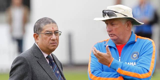 Narayanaswami Srinivasan (L), Secretary of the Board of Control for Cricket in India (BCCI), talks with India's coach Duncan Fletcher during a training session at Lord's Cricket Ground in London, on July 20, 2011.