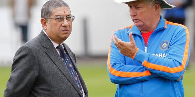 Narayanaswami Srinivasan (L), Secretary of the Board of Control for Cricket in India (BCCI), talks with India's coach Duncan Fletcher during a training session at Lord's Cricket Ground in London, on July 20, 2011.