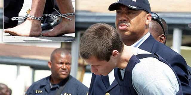July 11, 2010: Colton Harris-Moore, the teen fugitive dubbed the "Barefoot Bandit," is escorted by police in handcuffs, shackles -- and his bare feet -- to a facility in the Bahamas.