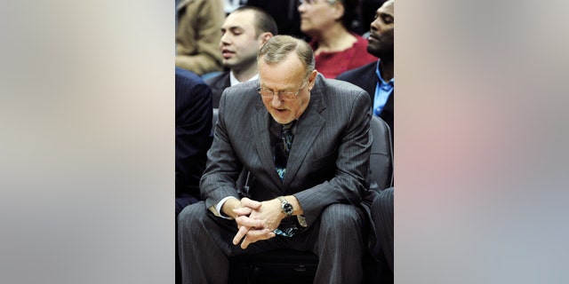 Minnesota Timberwolves head coach Rick Adelman looks toward the floor in the second half of an NBA basketball game against the Portland Trail Blazers, Saturday, Jan. 5, 2013, in Minneapolis. The Trail Blazers won 102-97. Before the game, the Timberwolves announced that Kevin Love had re-broken his hand and Nikola Pekovic had to leave the game with a hip injury. (AP Photo/Jim Mone)