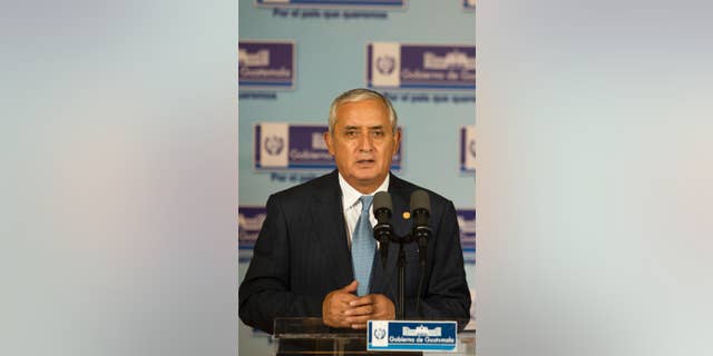In this April 23, 2015 photo, Guatemala's President Otto Perez Molina gives a press conference at the National Palace in Guatemala City. Guatemala's Supreme Court has given the go-ahead for congress to decide whether to remove President Otto Perez Molina's immunity from prosecution in a corruption scandal. (AP Photo/Moises Castillo)