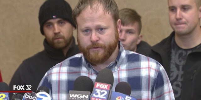 David Boyd speaking to reporters.