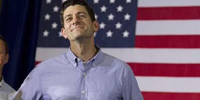 FILE: June 18, 2012: GOP Rep. Paul Ryan, R-Wis., at a campaign event with GOP presidential candidate Mitt Romney in Janesville, Wis.