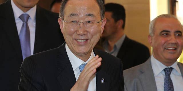 United Nations Secretary-General Ban Ki-moon waves to journalists on his arrival to meet with Lebanese parliament speaker Nabih Berri, in Beirut, Lebanon, Thursday, March 24, 2016. The U.N. chief arrived in Lebanon on an official visit that comes as the U.N.-brokered peace talks in Geneva between the Syrian government and the opposition are to adjourn until later in April. Ban will meet top Lebanese officials and address refugee support, youth unemployment, and private sector development. (AP Photo/Hussein Malla)
