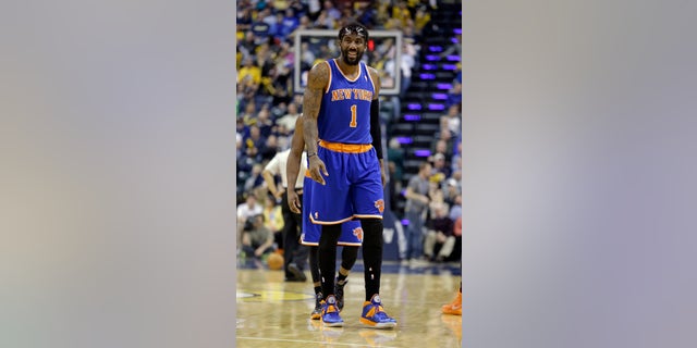 New York Knicks forward Amare Stoudemire walks off the court after being shaken up on a foul by the Indiana Pacers during the second half of an NBA basketball game in Indianapolis, Thursday, Jan. 16, 2014. The Pacers defeated the Knicks 117-89. (AP Photo/Michael Conroy)