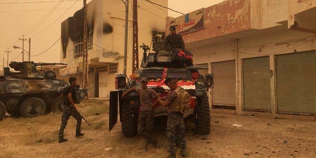 The Iraqi army is now clearing roads, buildings and homes of mines and booby traps, a painstaking operation that could take weeks.