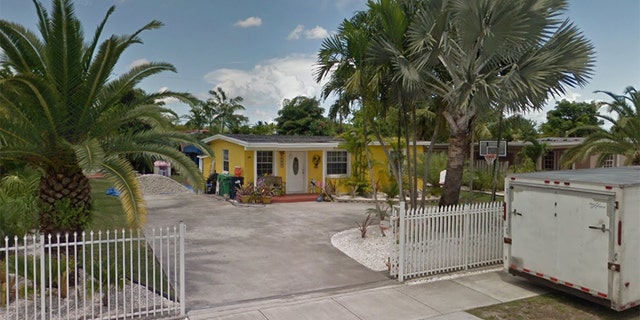 A 7-year-old girl was bit by her dog outside this home in Miami-Dade county.