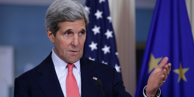 WASHINGTON, DC - MAY 06: U.S. Secretary of State John Kerry answers reporters' quesitons during a joint news conference with European Union High Representative Lady Catherine Ashton in the Treaty Room at the State Department May 6, 2014 in Washington, DC. The two leaders spoke about the ongoing conflicts in South Sudan, Syria and Ukraine. (Photo by Chip Somodevilla/Getty Images)