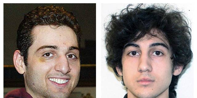 FILE - This combination of file photos shows brothers Tamerlan, left, and Dzhokhar Tsarnaev, suspects in the Boston Marathon bombings on April 15, 2013. A Friday, Oct. 10, 2014 filing by the defense says a prosecution witness against Dzhokhar Tsarnaev is prepared to testify that Tsarnaev knew his older brother Tamerlan was involved in a 2011 triple slaying, according to a filing by attorneys for the surviving brother. Tsarnaev has pleaded not guilty in the 2013 bombings that killed three people and injured about 260 others. (AP Photos/Lowell Sun and FBI, File)