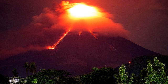 Jan. 15, 2018: Lava cascades down the slopes of Mayon volcano.
