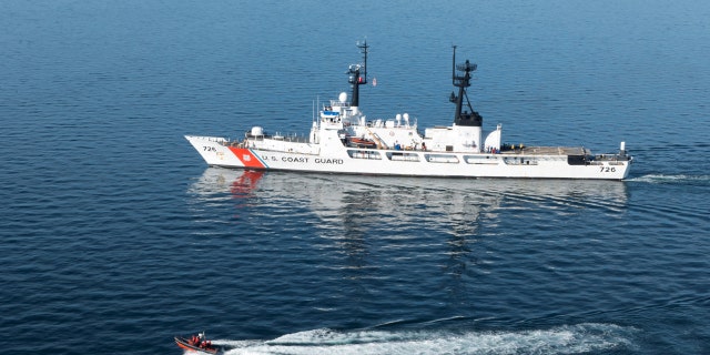 The Coast Guard Cutter Midgett, a 378-foot high-endurance cutter homeported in Seattle, transiting the Strait of Juan de Fuca en route to Seattle.