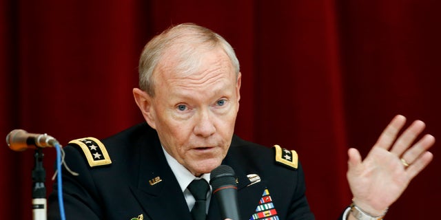 FILE - In this April 26, 2013, file photo, Chairman of the Joint Chiefs of Staff Gen. Martin Dempsey speaks during his lecture at Joint Staff College in Tokyo. One after another, the charges have tumbled out _ allegations of sexual assaults in the military that have triggered outrage, from local commanders to Capitol Hill and the Oval Office. But for the Pentagon there seem to be few clear solutions beyond improved training and possible adjustments in how the military prosecutes such crimes. Changing the culture of a male-dominated, change-resistant military that for years has tolerated sexism and sexist behavior is proving to be a challenging task. (AP Photo/Koji Sasahara, File)