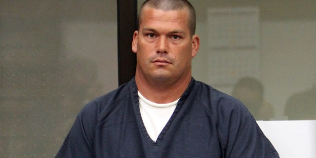 Mar. 3: John Albert Gardner III is escorted by sheriff deputies in a San Diego Superior Court. Gardner pleaded guilty in April to the murder of two California teenagers.
