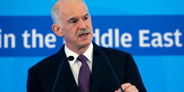 July 1: Greek Prime Minister George Papandreou, gives a speech during a European Socialist parties conference, in Athens.