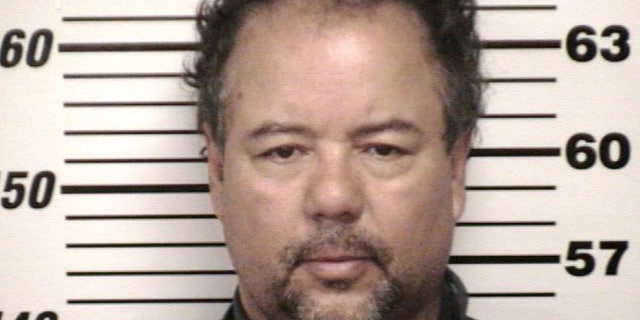 FILE - This undated file photo provided by Cuyahoga County Jail shows Ariel Castro. Cleveland officials are trying to keep Castro's house, where three women were imprisoned for a decade, intact until his trial is concluded. (AP Photo/Cuyahoga County Jail, File)