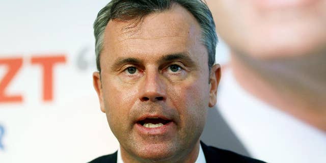FILE - In this Monday, March 14, 2016 file photo, Norbert Hofer, candidate for Sunday's presidential elections of Austria's Freedom Party, FPOE, speaks during a news conference in Vienna, Austria. Even before a vehemently anti-EU party won strong support in Austria, the European Union’s top official acknowledged that the 28-nation bloc was in trouble. “We are facing very tough times,” European Commission President Jean-Claude Juncker told parliamentarians this month. “We are not very popular when we advocate for Europe.”Those comments were reinforced just days later with the victory Sunday of an anti-EU right-wing party in the first round of Austria’s presidential election. (AP Photo/Ronald Zak, File)
