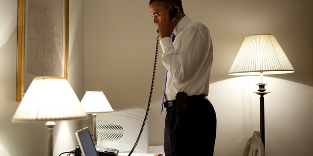 President Obama speaks with Missouri Governor Jay Nixon on the phone during Obama's visit to Dublin, Ireland, about the deadly tornado that hit Joplin, MO late Sunday. (White House Photo/Pete Souza)