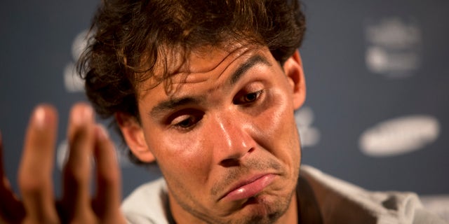 Rafael Nadal, of Spain, gestures during a press conference ahead of the Rio Open in Rio de Janeiro, Brazil, Friday, Feb. 13, 2015. The Rio Open tennis tournament starts Monday Feb. 16. (AP Photo/Silvia Izquierdo)