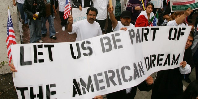 LOS ANGELES, CA - APRIL 15: Students and supporters march to call for amnesty for illegal immigrants on April 15, 2006 in Los Angeles, California. The 3,000 people who marched through downtown to City Hall particularly oppose House bill HR 4437 by Rep. F. James Sensenbrenner, R-Wisconsin that would increase penalties for immigrant smuggling, beef up penalties for undocumented immigrants who re-enter the United States, and require employers to report Social Security numbers to the Department of Homeland Security. The march is dedicated to Ontario, California student Anthony Soltero, 14, who committed suicide on March 30 after a school administrator allegedly told him he would be fined and jailed for participating in a student walkout in support of undocumented immigrants rights on March 28. (Photo by David McNew/Getty Images)
