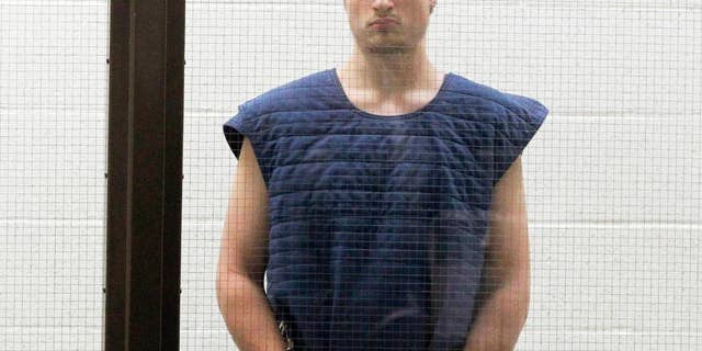 James Wesley Howell, 20, of Indiana, appears in Superior Court in Los Angeles Tuesday, June 14, 2016. Howell faces felony weapons charges after authorities say they found assault rifles and explosive chemicals in his car in Santa Monica, Calif., on June 12, before a major Los Angeles gay pride parade. (AP Photo/Nick Ut)