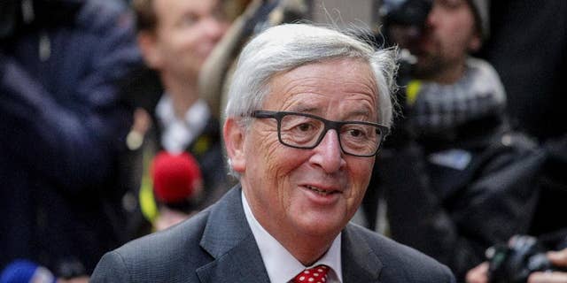 FILE- In this Friday, Oct. 21, 2016 file photo, European Commission President Jean-Claude Juncker arrives on the second day of the EU summit in Brussels. Juncker told German public radio Deutschlandfunk on Saturday, Feb. 11, 2017, he will not run for another term. (AP Photo/Olivier Matthys, File)