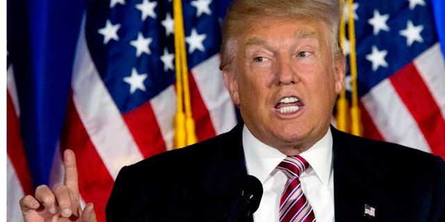 FILE - In this June 7, 2016 file photo, Republican presidential candidate Donald Trump speaks in Briarcliff Manor, N.Y. Powered by a solid triumph in California, Hillary Clinton seizes her place in history as the first women to become a presumptive presidential nominee and sets out to unite a fractured party to confront Donald Trump. (AP Photo/Mary Altaffer, File)