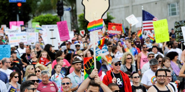 People participate in a Resist March that replaced the annual Pride Parade in Los Angeles, California, U.S., June 11, 2017.